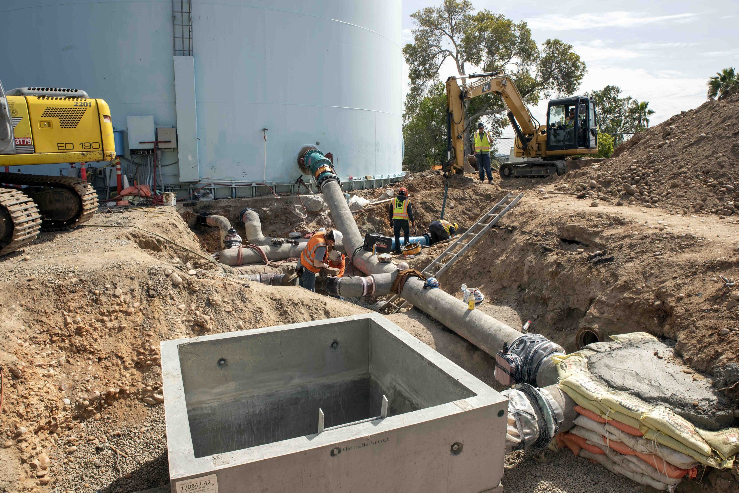 Navajo Pump Station - men working on pipes