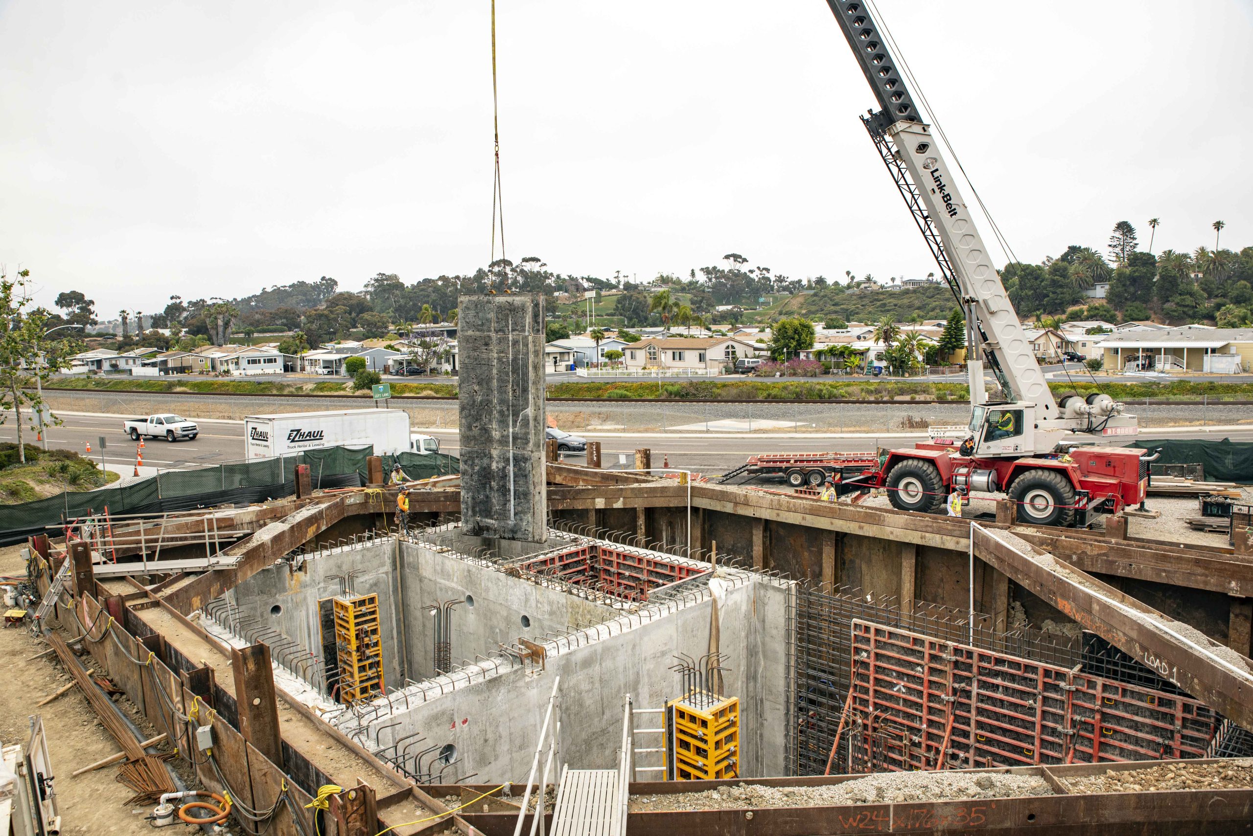 Oceanside Sewer Lift Station setting concrete walls in place