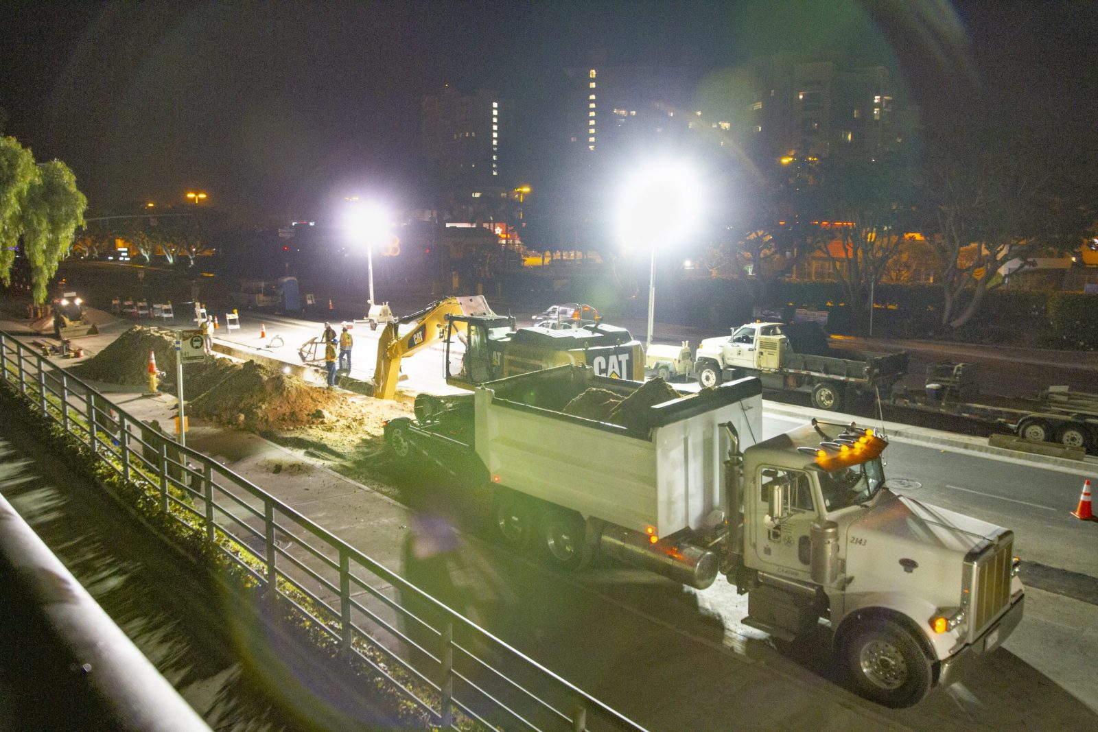 Genesee Avenue 18" Sewer - dump truck at trench, night scene