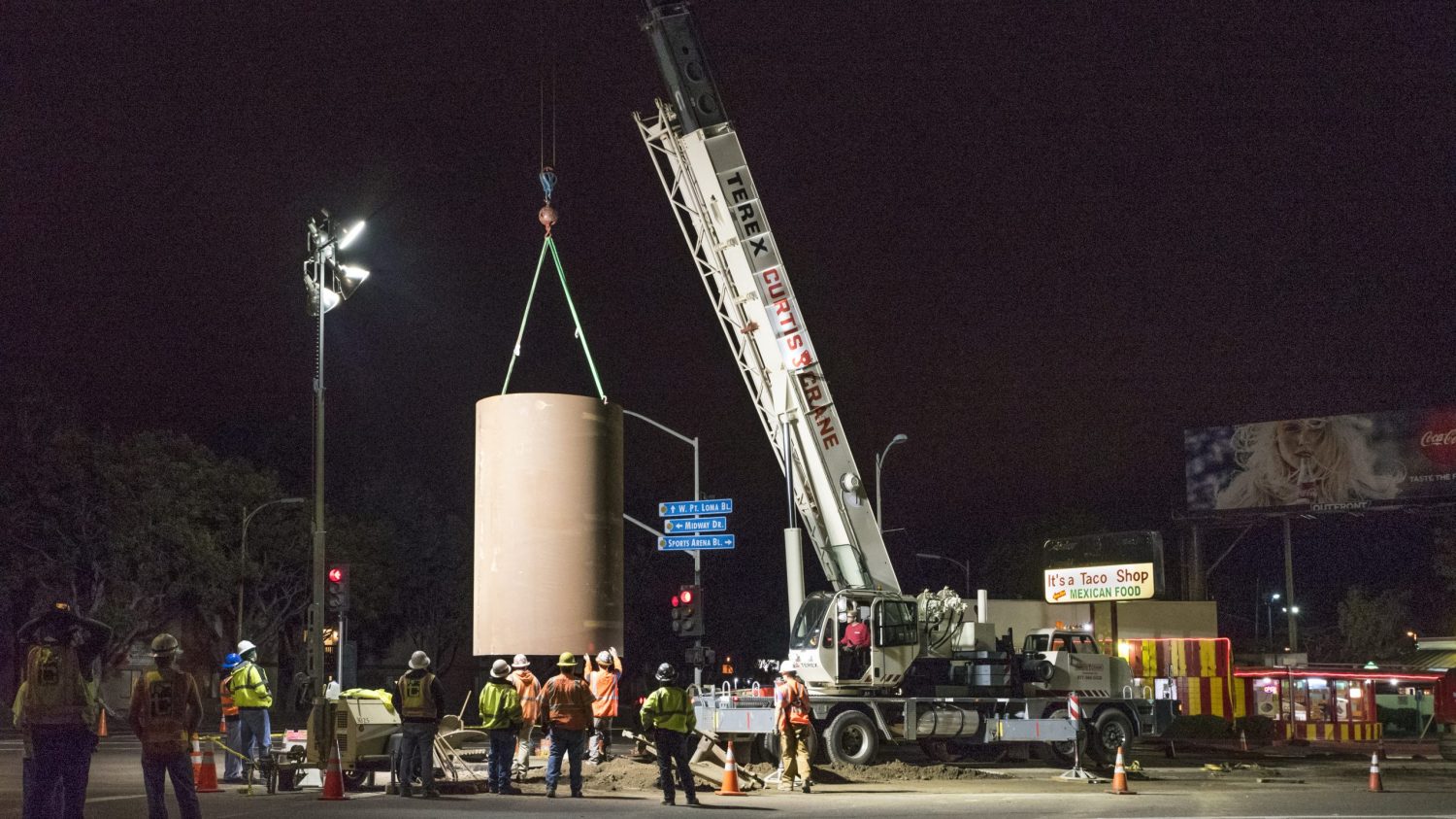 Pacific Beach Pipeline South night installation cylinder for drilling new manhole