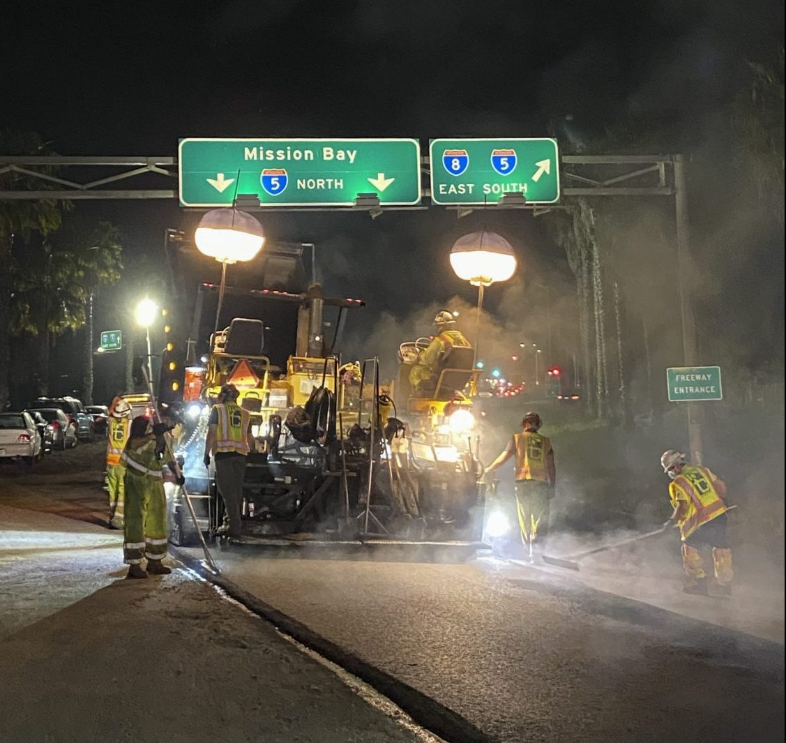16010 Pacific Beach Pipeline So night time photo of paving crew laying asphalt on Mission Bay Drive